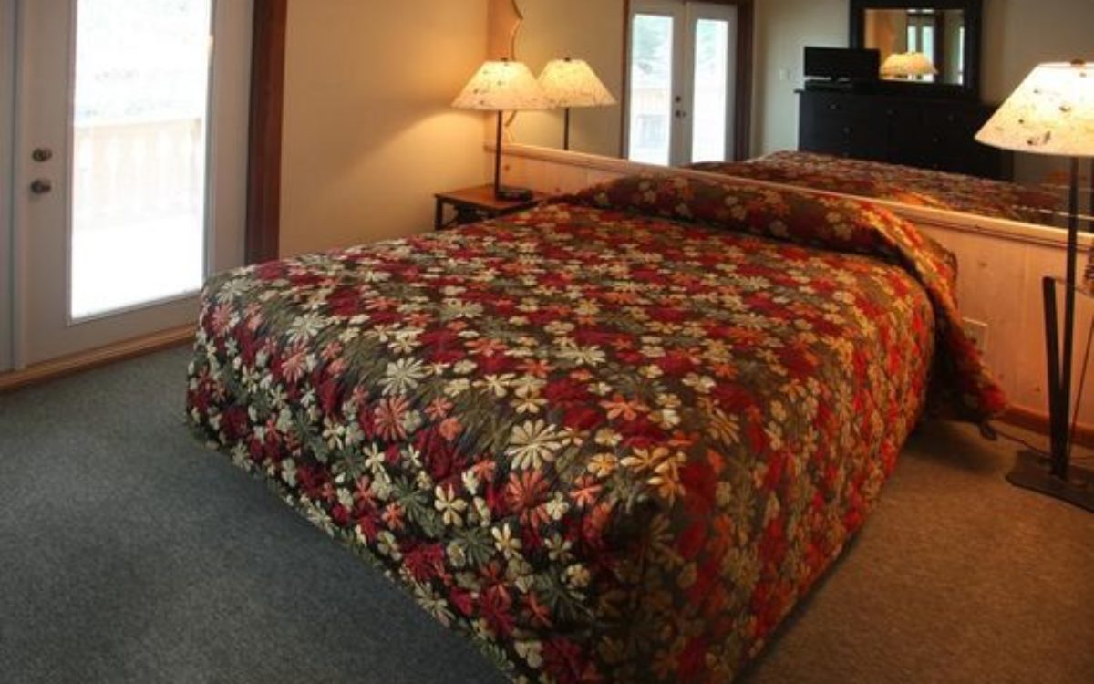 King bed in master bedroom in 2 bedroom Helen GA condo