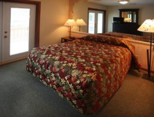 King bed in master bedroom in 2 bedroom Helen GA condo